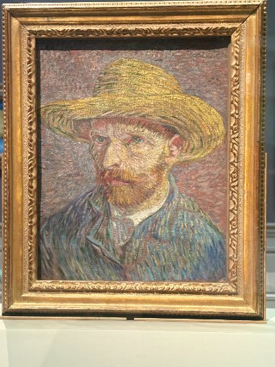Self-Portrait with a Straw Hat