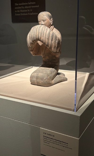 Kneeling Lady in Greeting Gesture